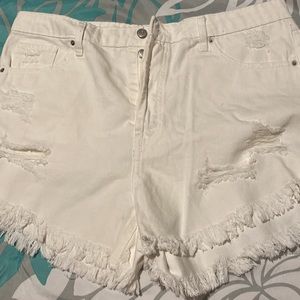 Distressed white shorts